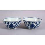 A PAIR OF CHINESE BLUE & WHITE MING STYLE PORCELAIN RICE BOWLS, each decorated with formal scrolling