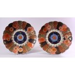 A PAIR OF JAPANESE MEIJI PERIOD IMARI PORCELAIN CHRYSANTHEMUM FORMED PLATES, each decorated with
