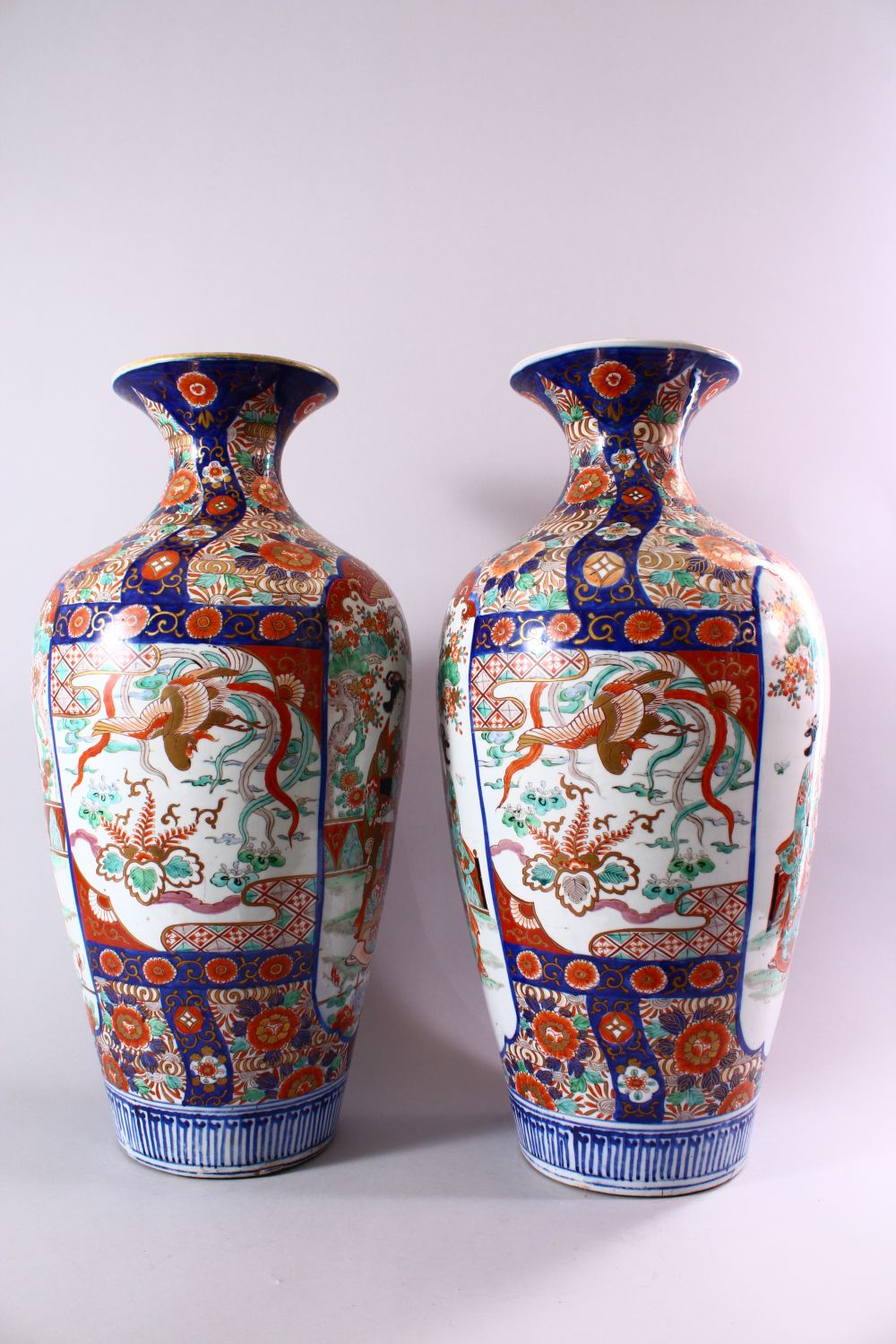 A LARGE PAIR OF JAPANESE MEIJI PERIOD IMARI PORCELAIN VASES, with panel decoration depicting figures - Image 6 of 6