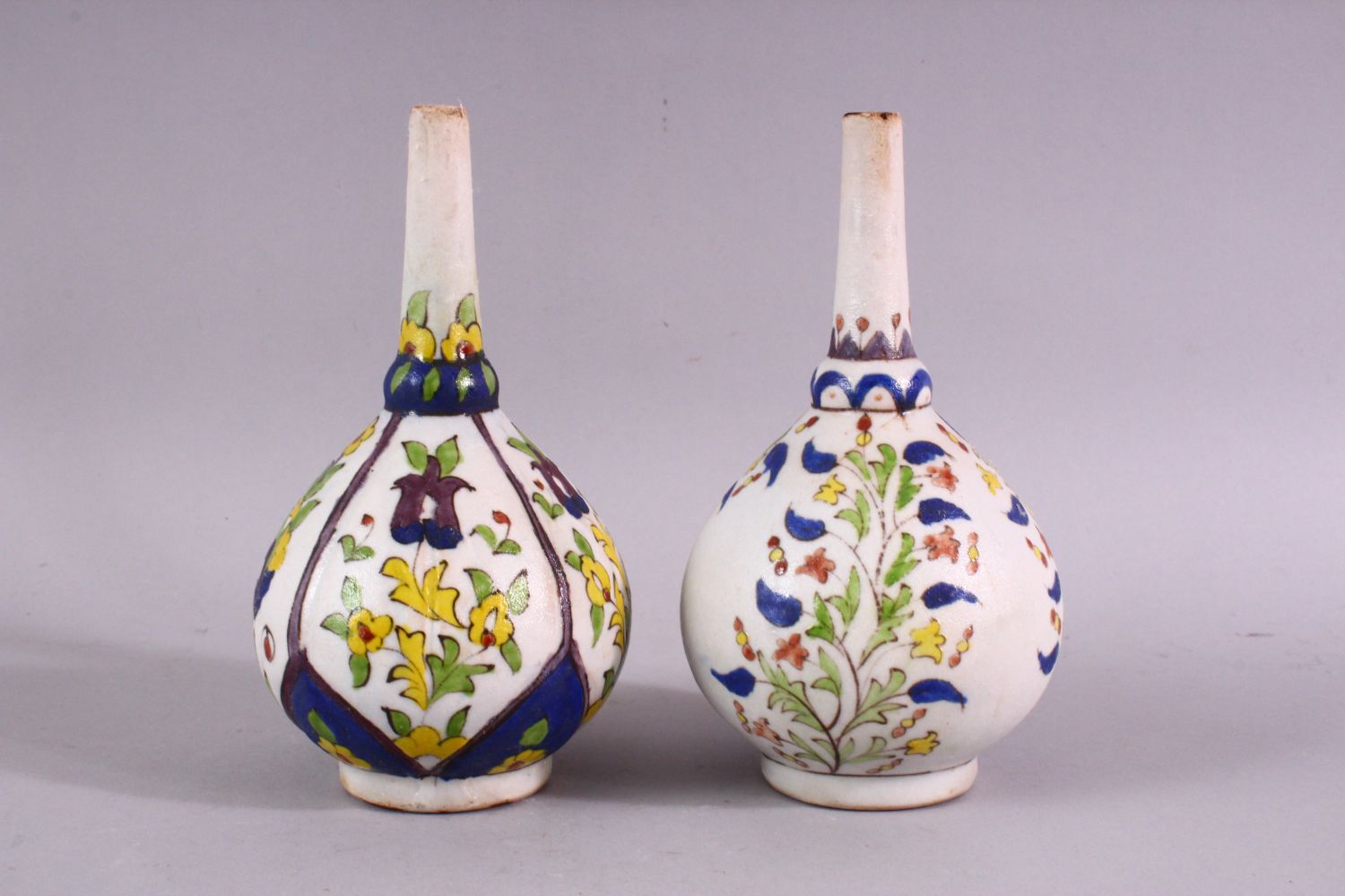TWO ISLAMIC FLORAL DECORATED ROSEWATER SPRINKLERS, 15cm high. - Image 2 of 4