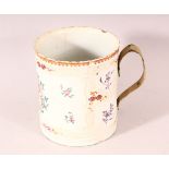 A 19TH CENTURY CHINESE FAMILLE ROSE EXPORT TANKARD, painted with monogram and floral sprays (AF),