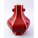 A GOOD CHINESE COPPER RED HEXAGONAL PORCELAIN VASE, the body with ribbed sections with monochrome