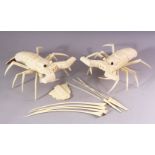 A PAIR OF JAPANESE 20TH CENTURY CARVED BONE MODELS OF CRAYFISH, 30cm long.