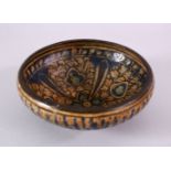 AN EARLY PERSIAN SULTAN ABBAD POTTERY BOWL, with floral motif decoration, 18cm.