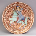 A GOOD 19TH CENTURY ISLAMIC PERSIAN POTTERY PLATE, decorated with a border of calligraphy around a