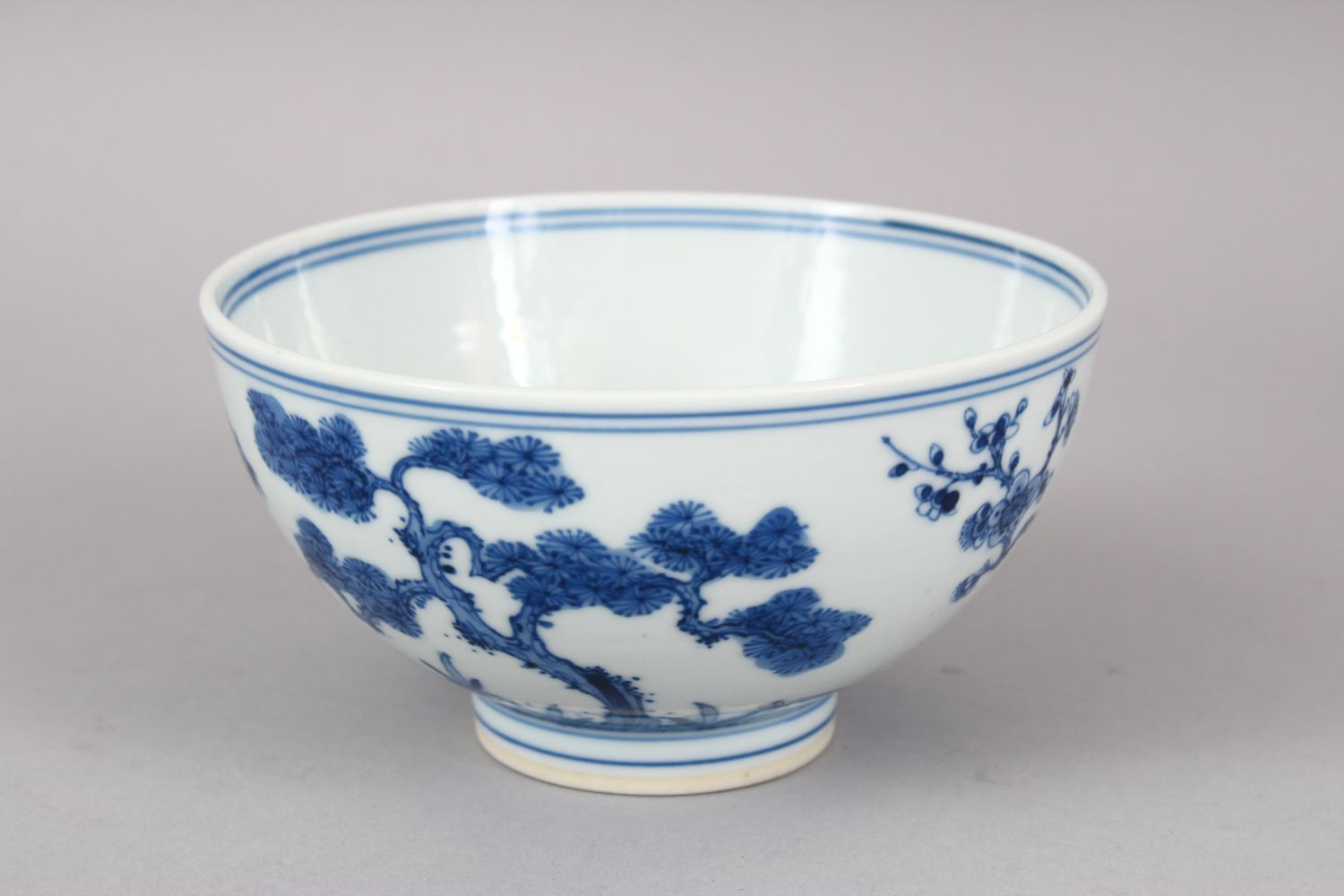 A CHINESE BLUE & WHITE PORCELAIN BOWL, the body with native flora and foliage, the base with a six - Image 4 of 6
