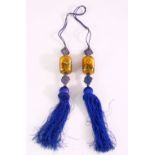 A SET OF 19TH / 20TH CENTURY CHINESE REVERSE PAINTED GLASS DROPS, the tassel set with two glass