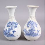 A PAIR OF JAPANESE MEIJI PERIOD BLUE & WHITE HIRADO PORCELAIN VASES, each decorated with floral