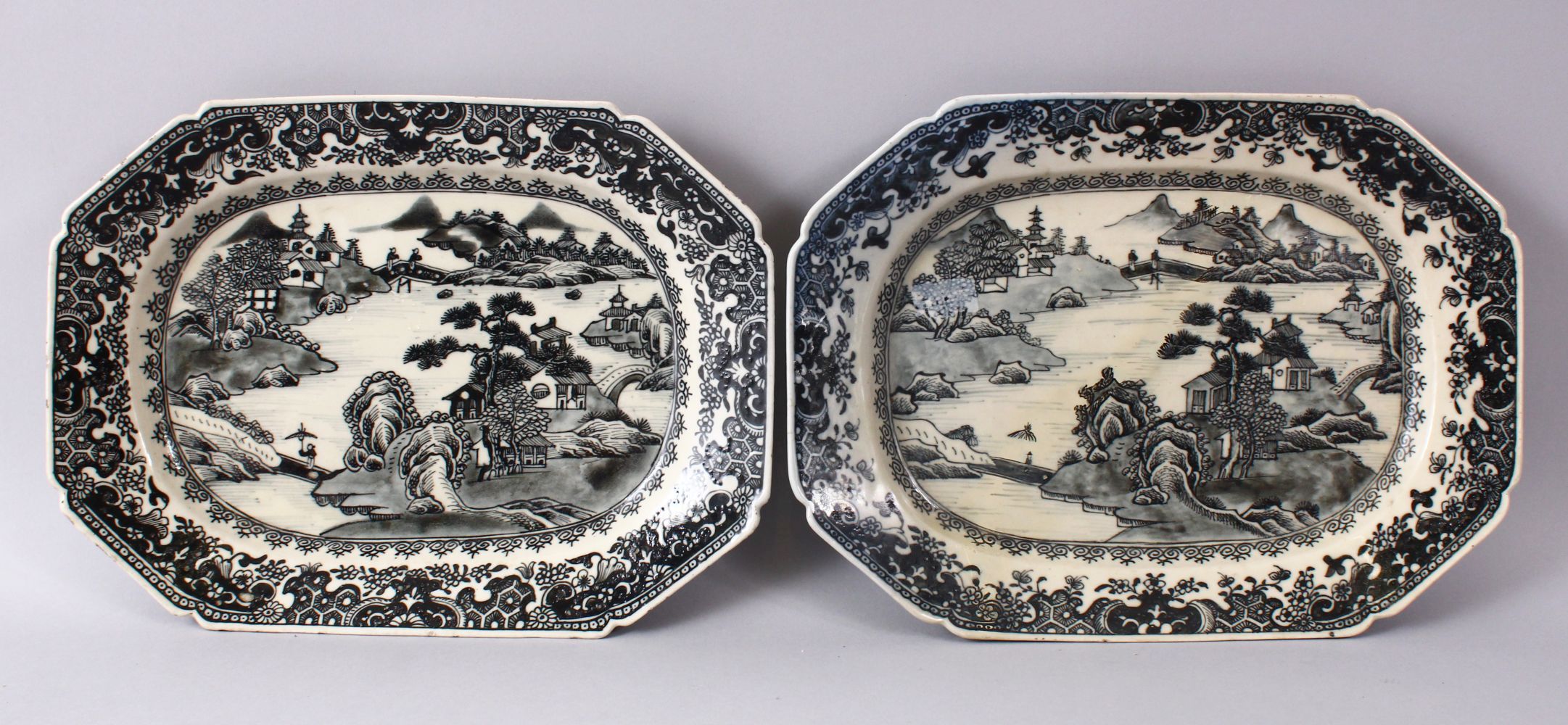 A PAIR OF CHINESE 19TH CENTURY WILLOW PATTERN SERVING DISHES, 33cm wide.