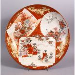 A JAPANESE MEIJI PERIOD KUTANI PORCELAIN CHARGER, with decoration of figures exterior, birds amongst