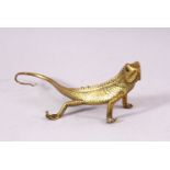 A SMALL POLISHED BRASS LIZARD, 17cm long.