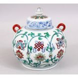 A SMALL CHINESE DOUCAI PORCELAIN JAR AND COVER, the body of the jar decorated with formal