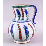 AN IZNIK STYLE POTTERY JUG, with classic Iznik style floral decoration, Cantagalli mark to base,