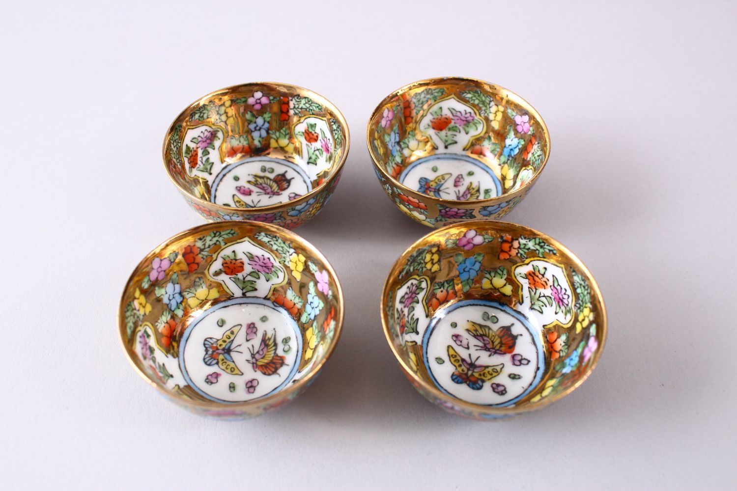 FOUR CHINESE REPUBLIC STYLE PORCELAIN CUPS IN BOX, decorated upon a gilt ground with flora and - Image 3 of 4