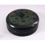 AN INDIAN PAPIER MACHE CIRCULAR BOX AND COVER, 12cm diameter.