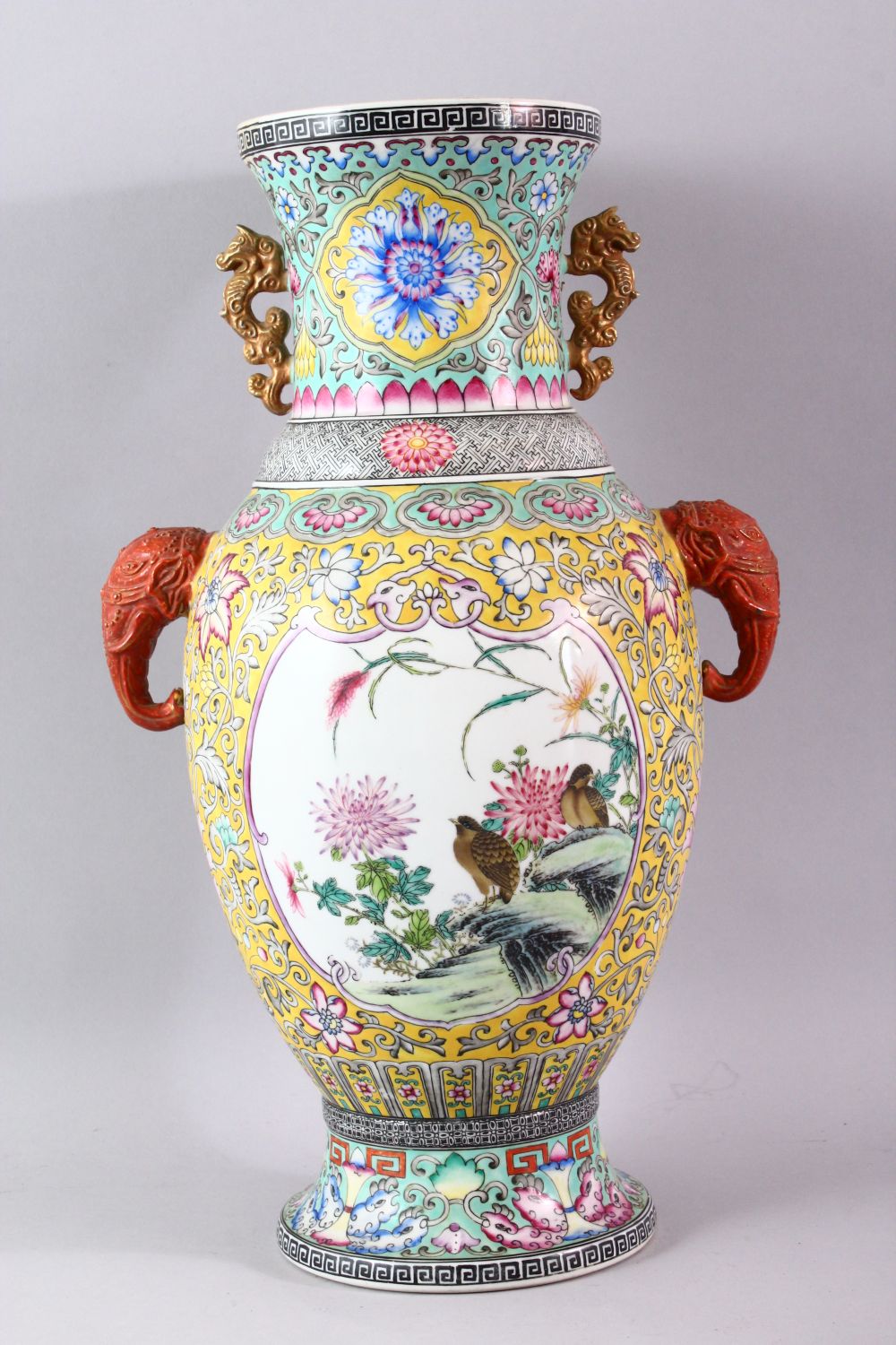 A GOOD LARGE FAMILLE ROSE BALUSTER SHAPE VASE, with coral coloured elephant head handles, painted - Image 5 of 6