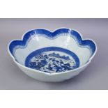 AN 18TH CENTURY CHINESE BLUE AND WHITE PORCELAIN LOBED EDGE BOWL, the bowl decorated with landscapes