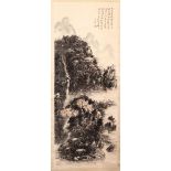 A 20TH CENTURY CHINESE SCROLL PAINTING, depicting a mountainous landscape, image 112cm x 42cm.