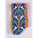 A 15TH CENTURY PERSIAN OR CENTRAL ASIAN TIMURID CUERDA SECA TILE, the tile with stylized motif