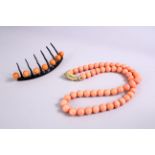 A SEA BAMBOO / CORAL NECKLACE, and similar hair slide.