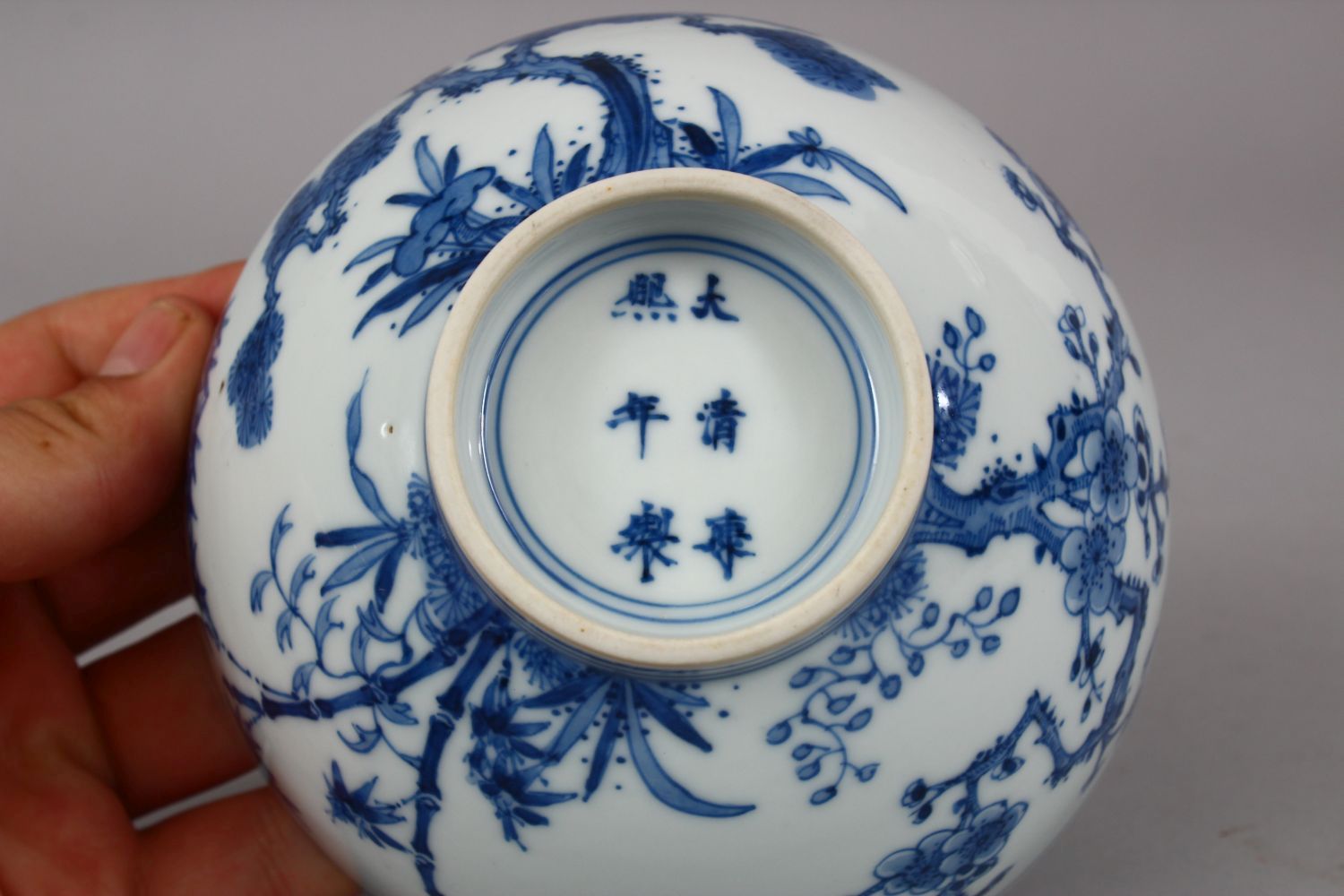 A CHINESE BLUE & WHITE PORCELAIN BOWL, the body with native flora and foliage, the base with a six - Image 6 of 6