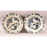 A PAIR OF CHINESE WANLI PERIOD BLUE & WHITE SHIPWRECK PORCELAIN PEACOCK DISHES.