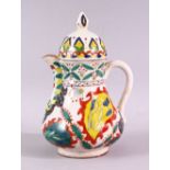 A 19TH CENTURY TURKISH KUTAHYA WATER JUG AND COVER, overall height 20cm.