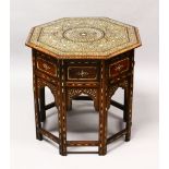 A GOOD LATE 19TH / EARLY 20TH CENTURY ISLAMIC BONE INLAID OCTAGONAL TABLE, profusely inlaid with