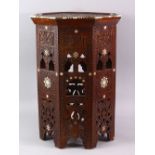 A SMALL 19TH CENTURY INDIAN HARDWOOD OCTAGONAL TRAVELLING OCCASIONAL TABLE, the table inlaid with