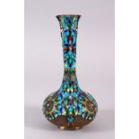 AN UNUSUAL PERSIAN ENAMELLED SILVER VASE, inlaid with turquoise stones and pearl, 19cm high.