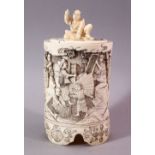 AN EARLY 20TH CENTURY JAPANESE CARVED IVORY TUSK VASE AND COVER, the exterior carved with numerous