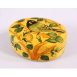 A 19TH / 20TH CENTURY PERSIAN LACQUER LIDDED BOX, decorated with birds and flora, 9cm