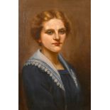 Early 20th century British school, A bust length portrait of a lady, oil on canvas, 24" x 16".