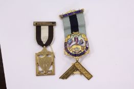 A 9ct and silver gilt Masonic badge.