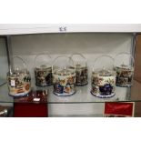 Six Imari style porcelain biscuit barrels with plated mounts.