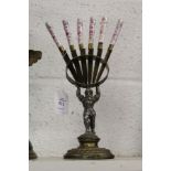 An unusual cast metal figural night holder with a set of six porcelain handled fruit knives.