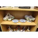 A small pair of Meissen blue and white plates with pierced borders, and two decorative floral