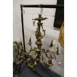 A good heavy ormolu rococo style eight branch chandelier.
