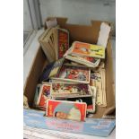 A box of assorted collector's cards.