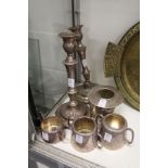 A pair of plated candlesticks and other items.