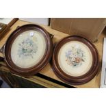 Floral subjects, a pair, framed and glazed ovals.