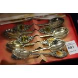 A set of six decorative spoons.