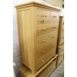 A good modern light oak chest of drawers.