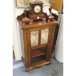 A Victorian rosewood music cabinet.