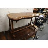 A Victorian walnut low stretcher table.