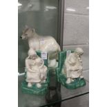 A Royal Doulton polar bear and pair of Bretby bookends (AF).