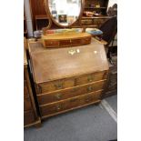 An 18th century oak bureau.