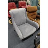 A modern plush velour upholstered armchair in the style of Marco Zanusso.