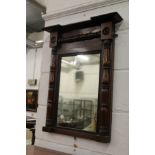 A 19th century mahogany pier mirror with split baluster columns.