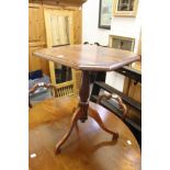 A mahogany tripod occasional table.